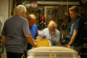 Stephen sharing a jig in his woodshop